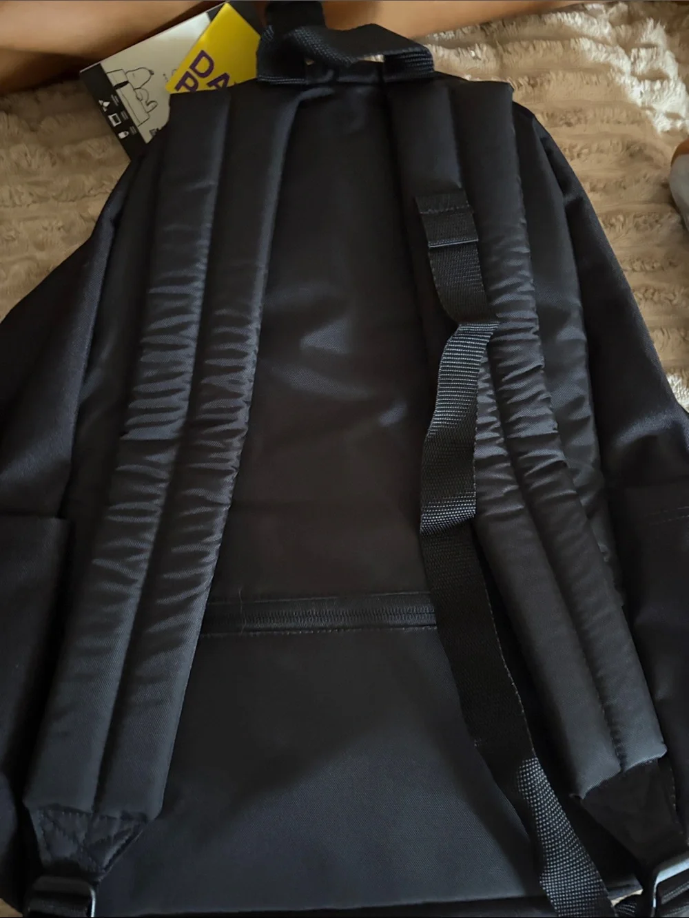Eastpak Black Backpack with White Peanuts Graphic